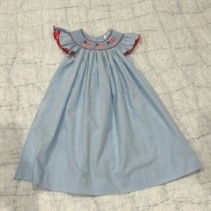 American flag smocked dress.  Excellent condition.  24 months.